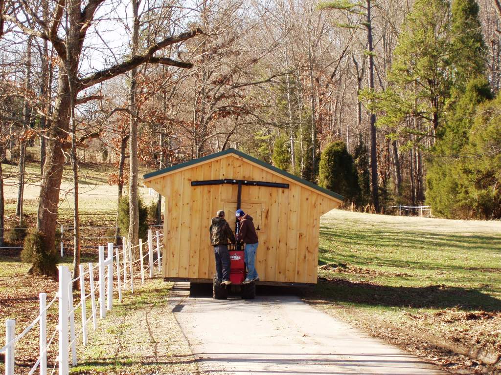 12x32 stall barn with custom 4' overhang coming down driveway